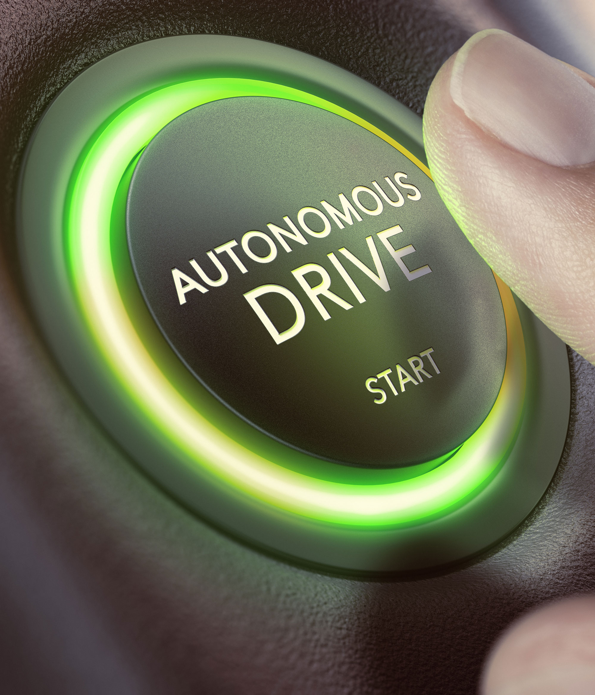 Finger pressing a push button to start a self-driving car. 